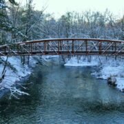 Bridge over icy river in Chippewa Valley, WI