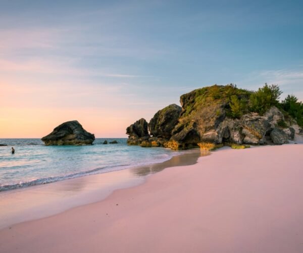 Pink Sand Beaches & Ritzy Resorts: Leave Your Winter Blues Behind For This Underrated Island